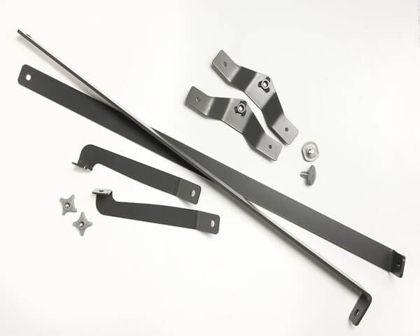 Aerial view product image of the Cargo Barrier Straps for the Mitsubishi SUV PHEV with nuts and blots also on display.