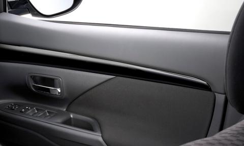 Interior view of a Mitsubishi SUV PHEV featuring the sleek Black Accent Panel.