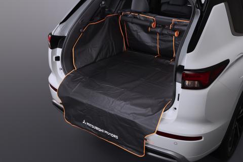 Black and orange Mitsubishi cargo area cover for boot