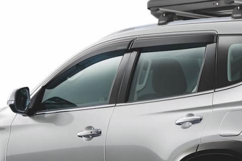 Monsoon shield set mounted to the window of a Mitsubishi Pajero Sport